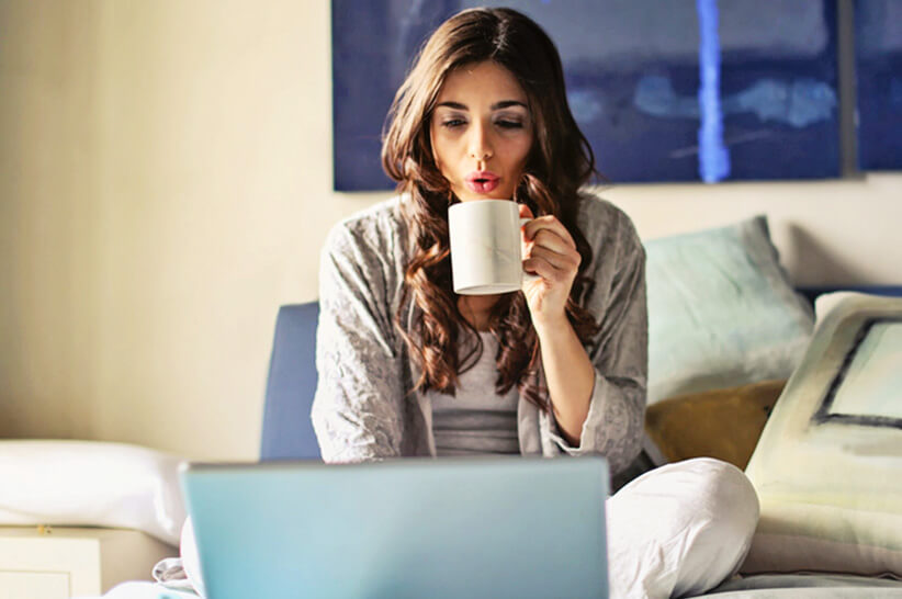 a woman drinking keto coffee