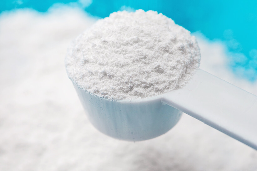 sucralose in a measuring teaspoon