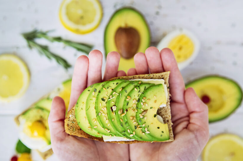 slices of avocados with sesame seeds