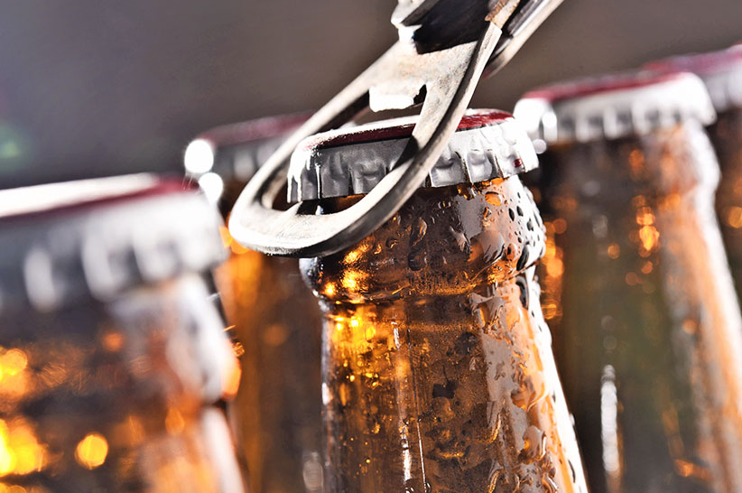 bottles of beer with an opener